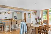 Plenty of space to dine. Pull up a chair at the breakfast-bar and enjoy a chilled glass of wine as lunch is prepared, or relax around the farmhouse table with a leisurely supper.