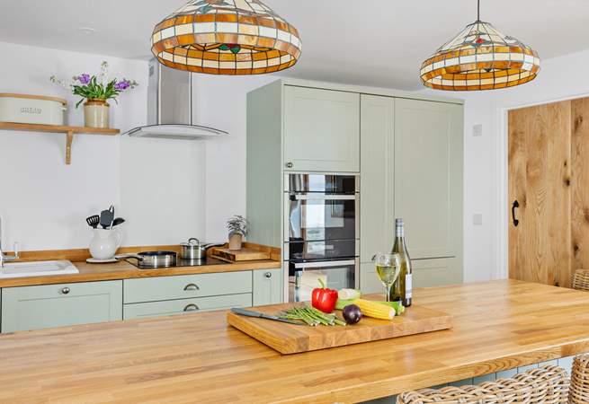 The kitchen is fully equipped and ready for you to prepare a family feast.