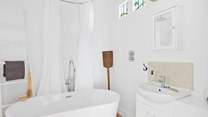 Clever reclaimed stained glass windows add a lovely touch.