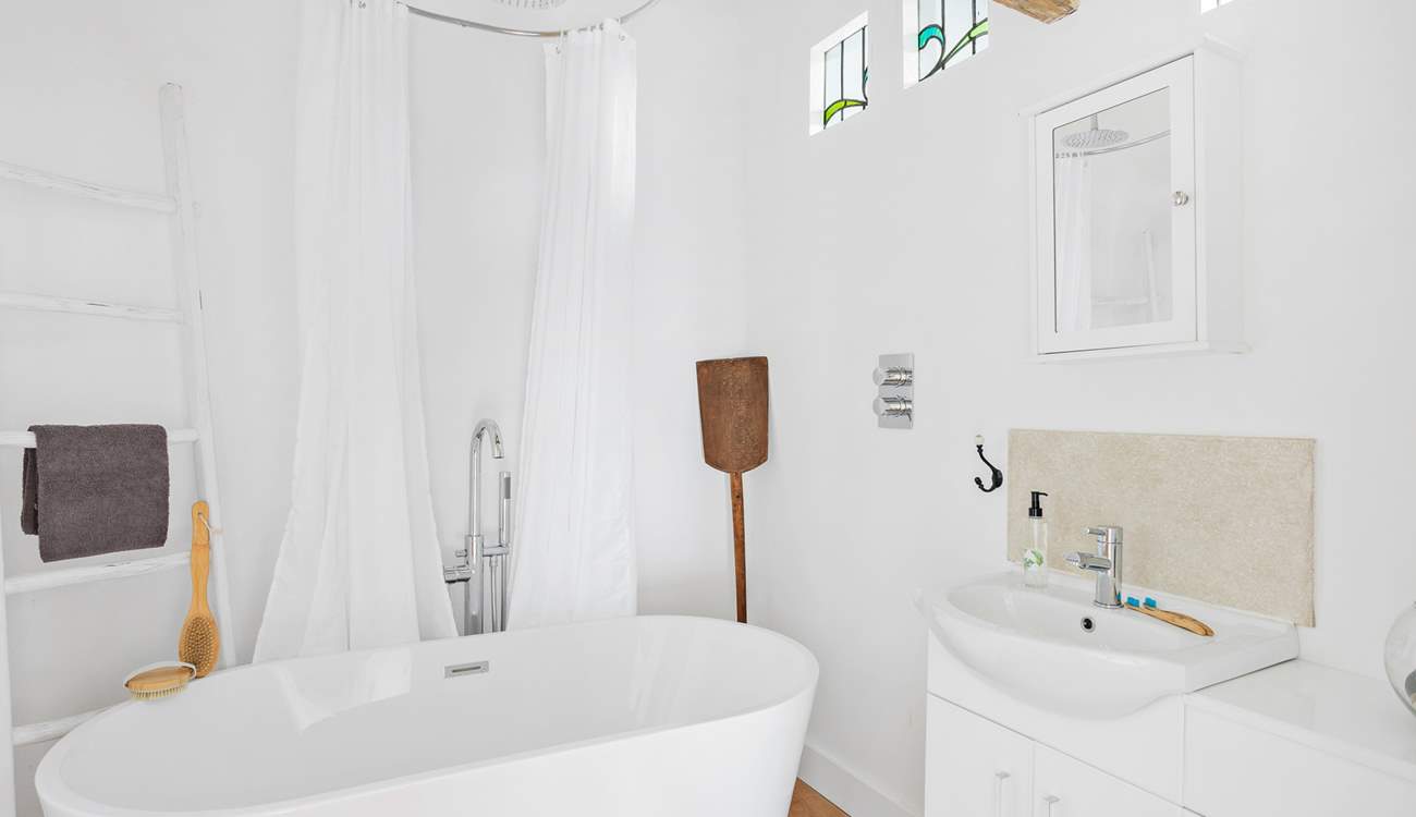 Clever reclaimed stained glass windows add a lovely touch.