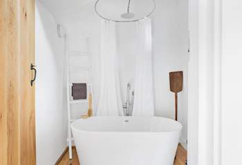 The family bathroom sits at the end of the landing and is shared between bedrooms 2 and 3.