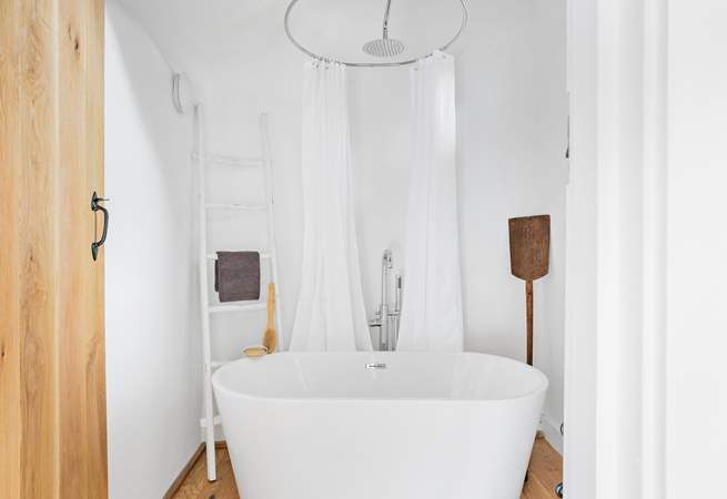 The family bathroom sits at the end of the landing and is shared between bedrooms 2 and 3.