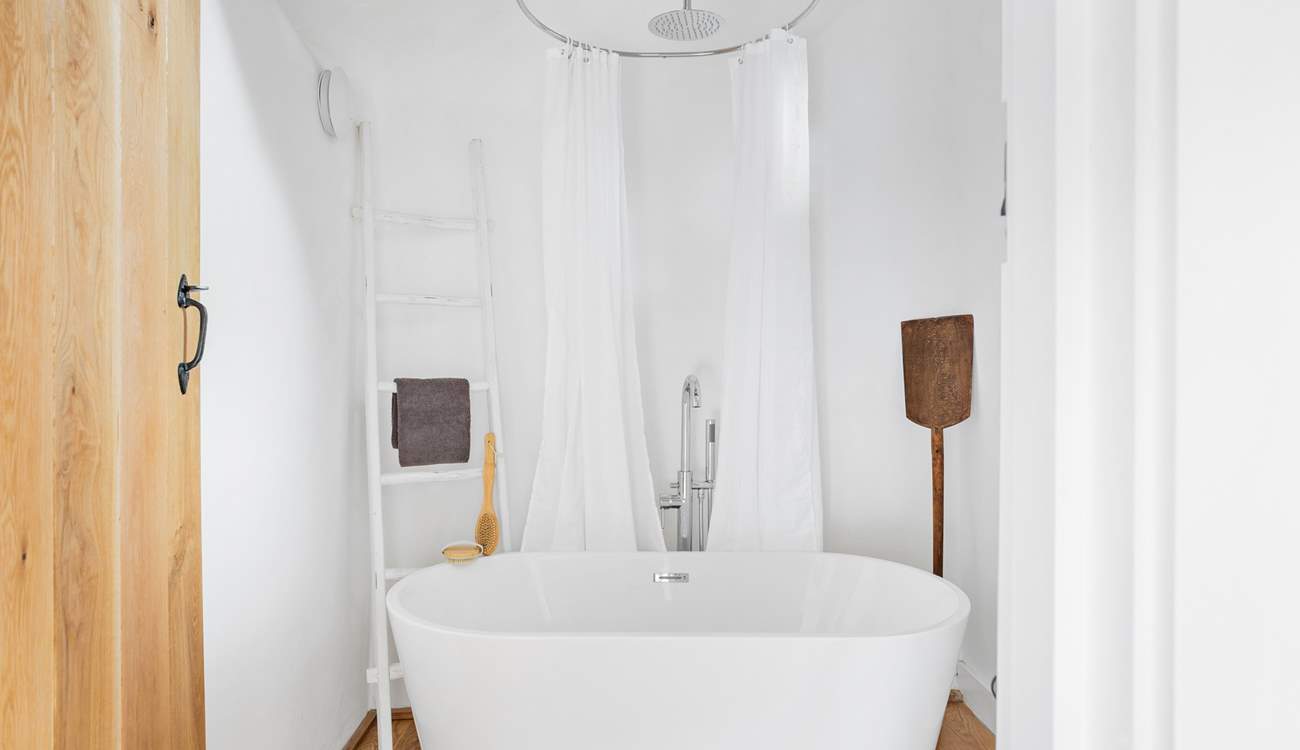 The family bathroom sits at the end of the landing and is shared between bedrooms 2 and 3.