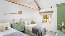 Bedroom 3 is a perfect twin with views out across the garden.