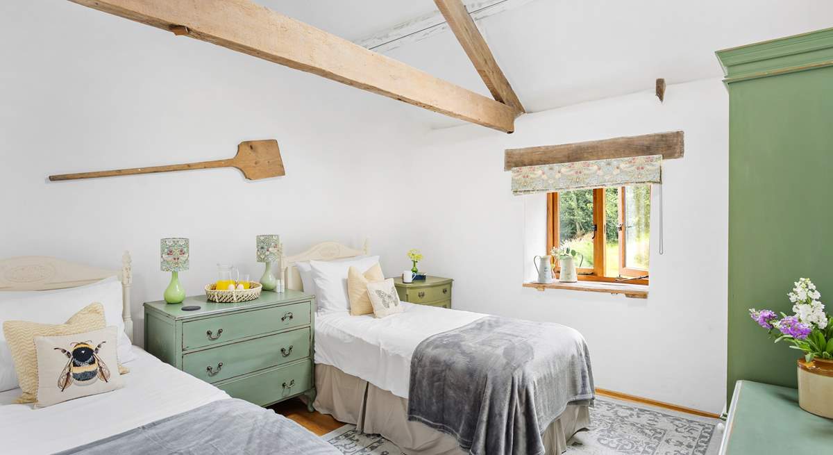 Bedroom 3 is a perfect twin with views out across the garden.