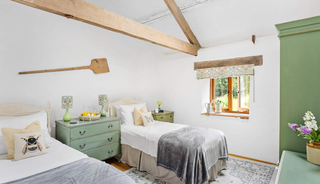 Bedroom 3 is a perfect twin with views out across the garden.