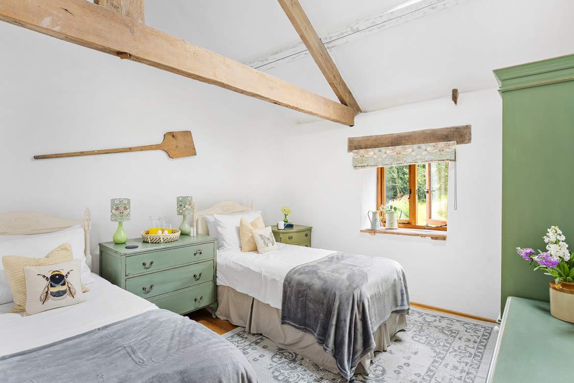 Bedroom 3 is a perfect twin with views out across the garden.