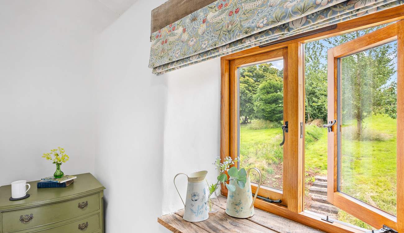 Rural bliss and a garden and meadow that's waiting to be enjoyed.