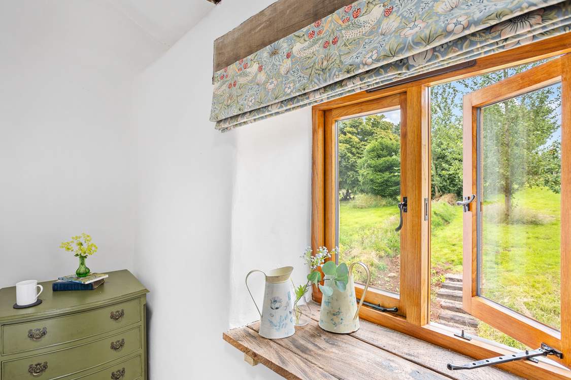 Rural bliss and a garden and meadow that's waiting to be enjoyed.