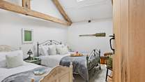 Bedroom 2 offers the versatility of a king-size double bed and a single bed.
