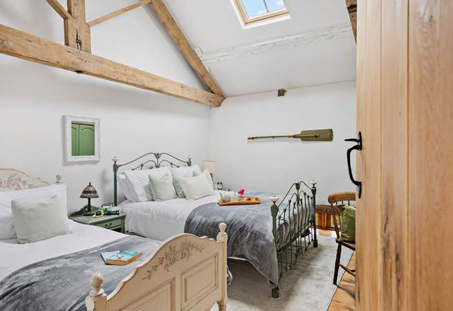 Bedroom 2 offers the versatility of a king-size double bed and a single bed.