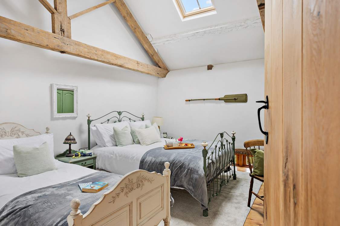 Bedroom 2 offers the versatility of a king-size double bed and a single bed.