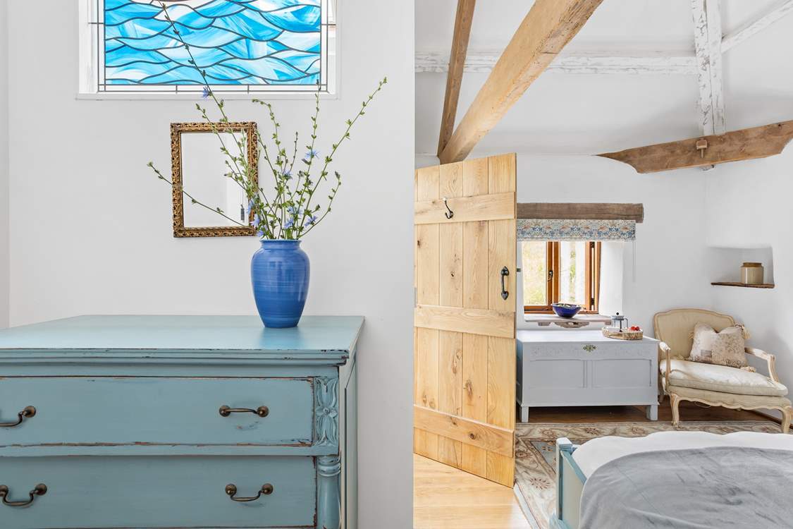 With views out across the garden towards the back of the barn.