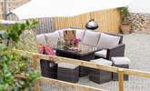 Head outdoors to the gravelled outside space and enjoy the electric barbecue and setting. - Thumbnail Image