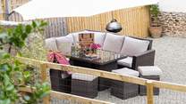 Head outdoors to the gravelled outside space and enjoy the electric barbecue and setting.