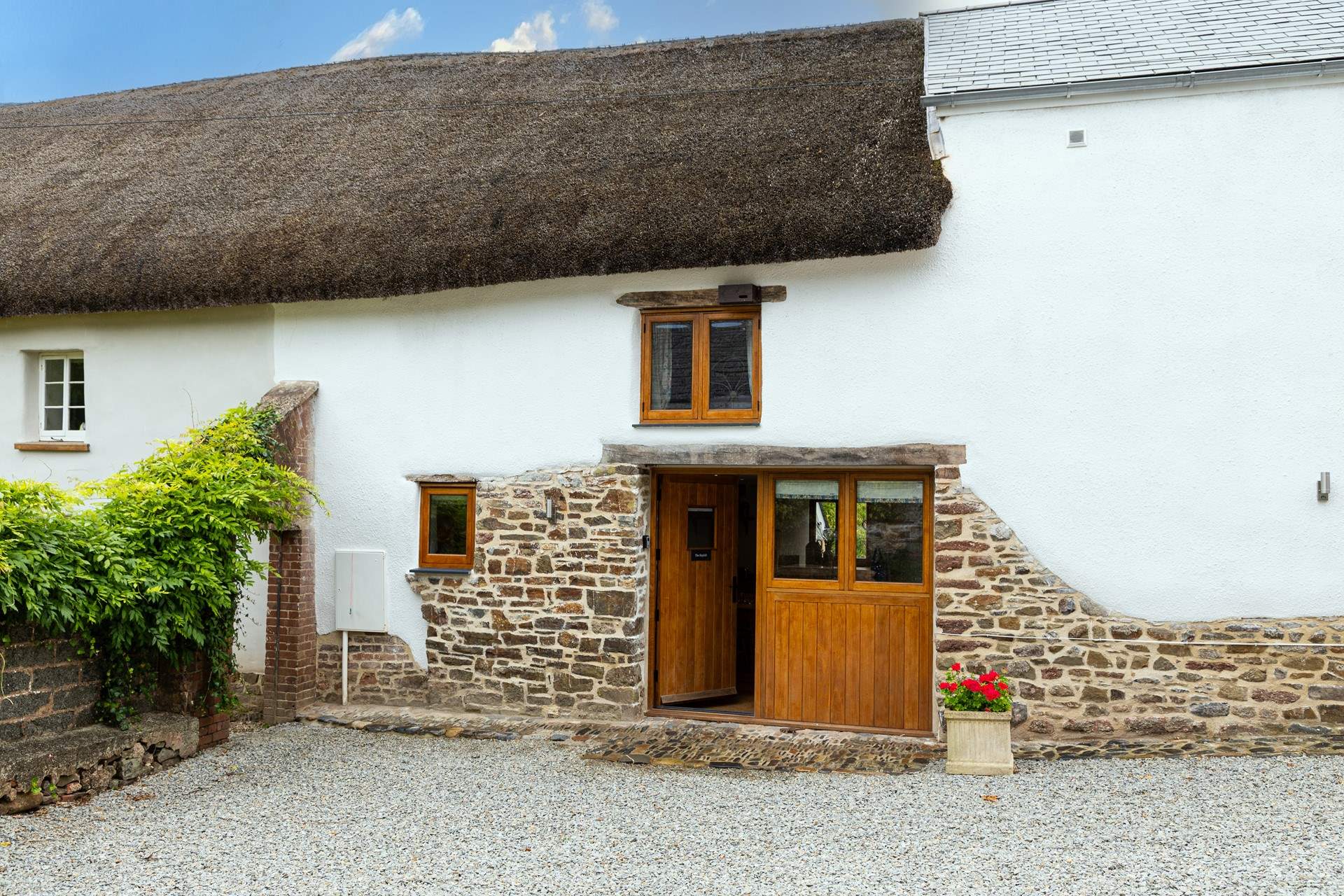 The Hayloft, a rather charming thatched barn in the middle of a lovely Devon village.