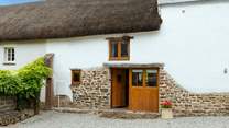 The Hayloft, a rather charming thatched barn in the middle of a lovely Devon village.