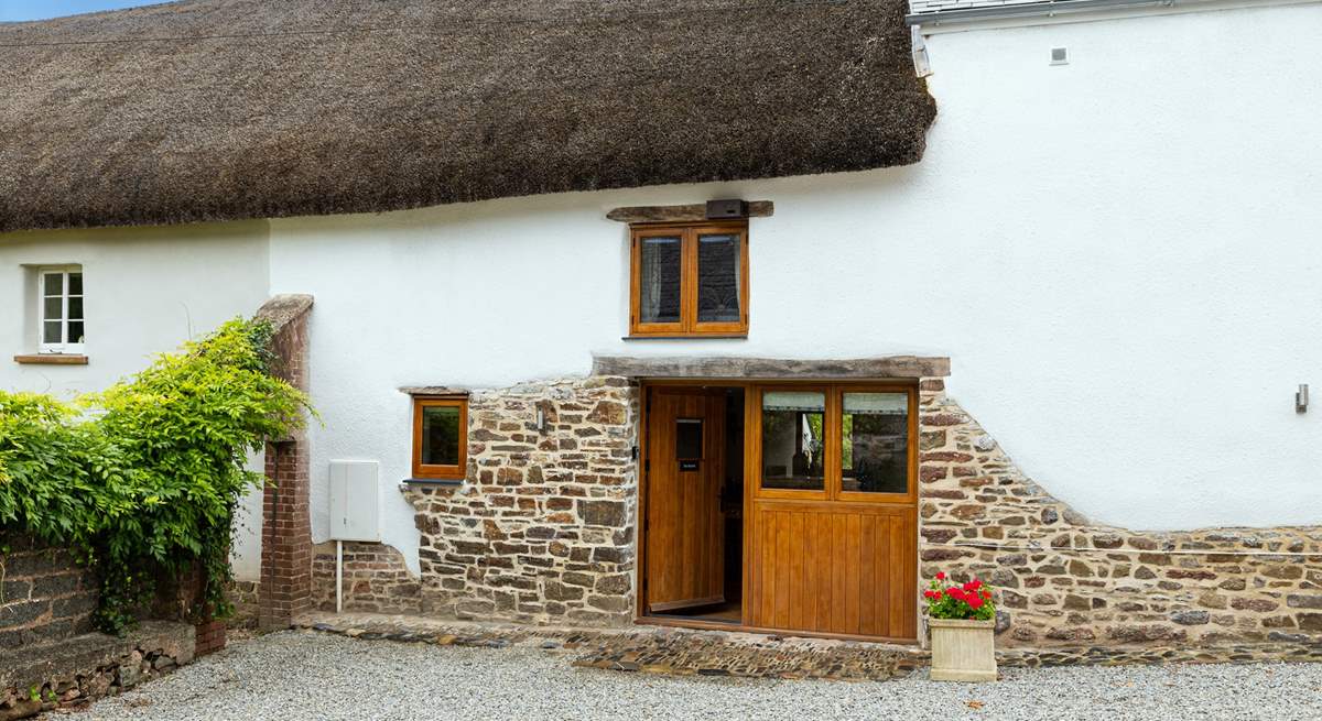 The Hayloft, a rather charming thatched barn in the middle of a lovely Devon village.