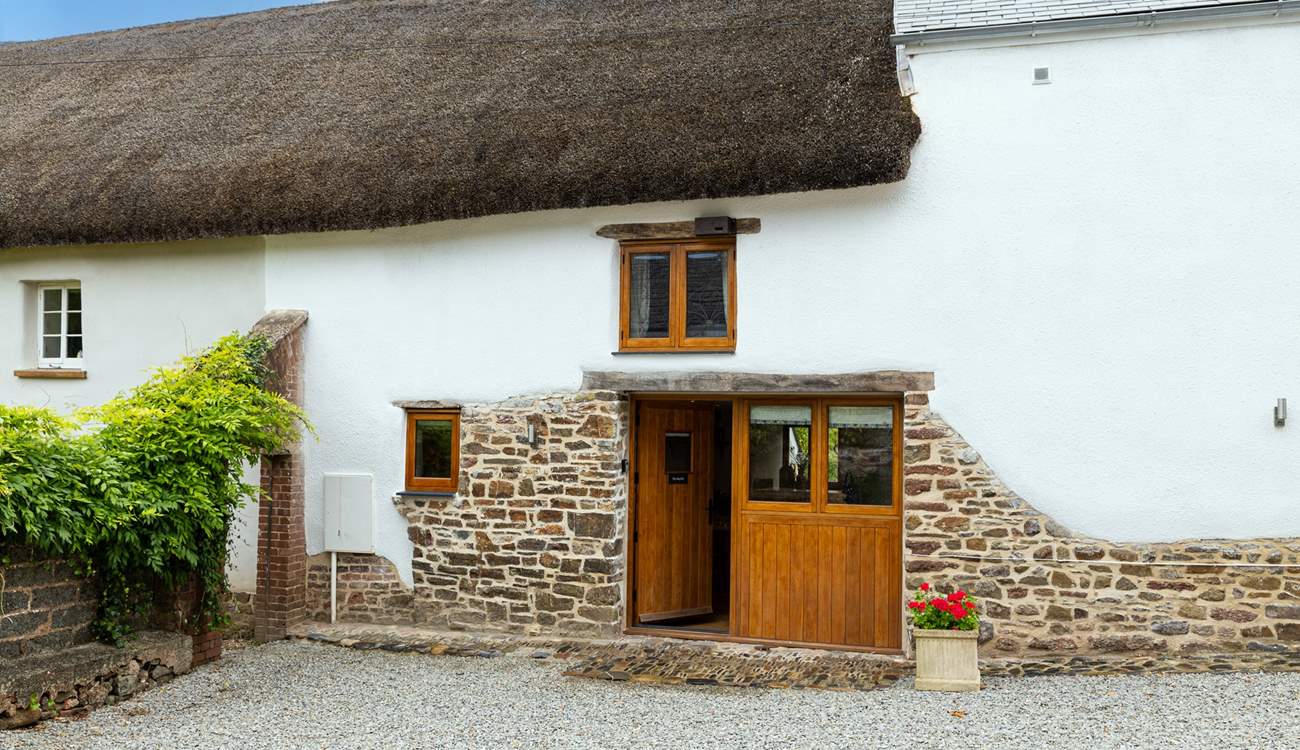 The Hayloft, a rather charming thatched barn in the middle of a lovely Devon village.