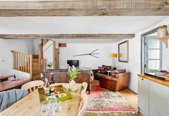 It's filled with gorgeous pieces of furniture adding to the character of this cheerful barn.
