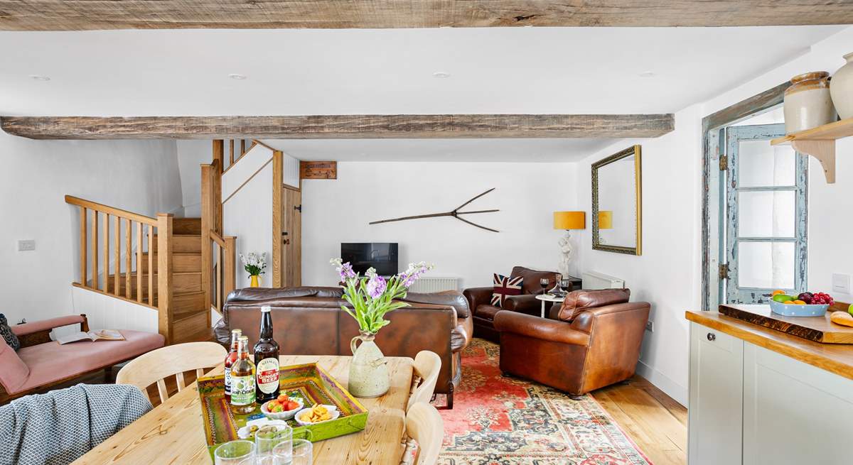 It's filled with gorgeous pieces of furniture adding to the character of this cheerful barn.