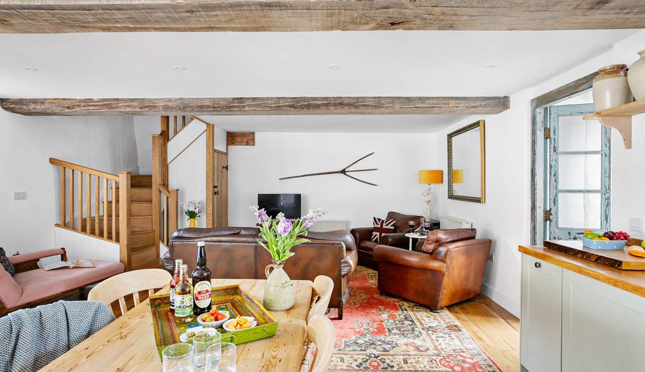 It's filled with gorgeous pieces of furniture adding to the character of this cheerful barn.