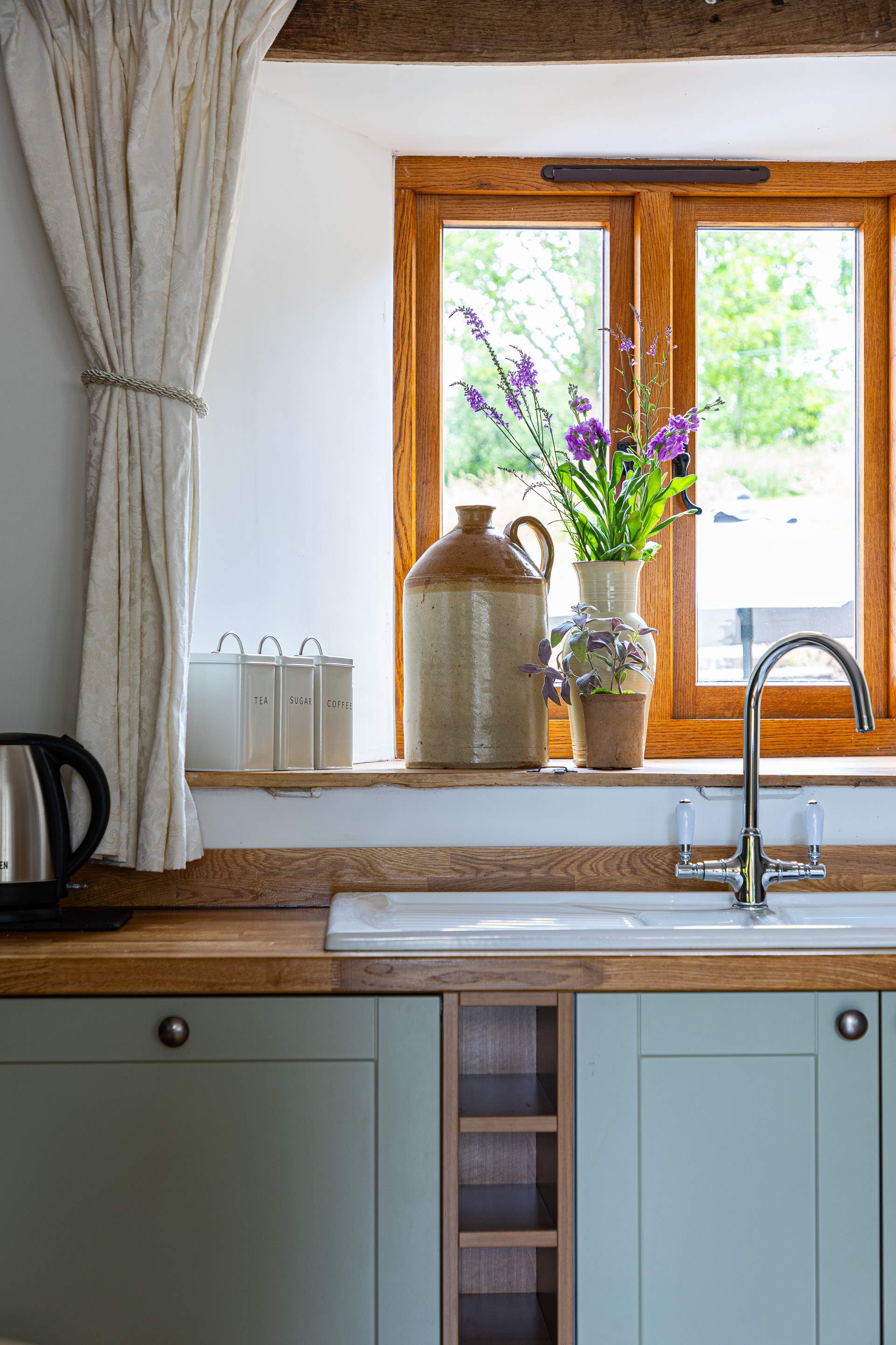 There are views out across the courtyard and garden.