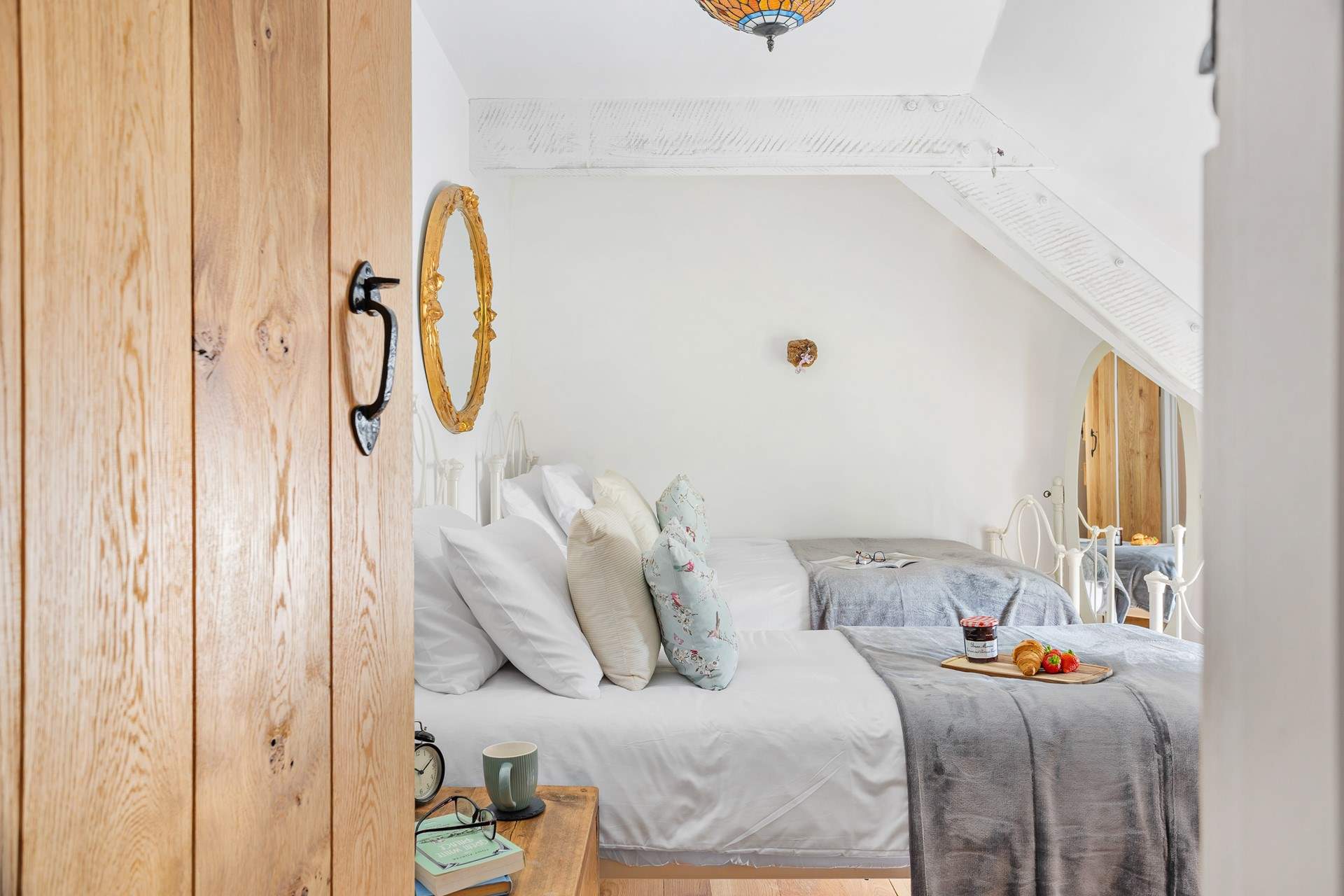 A twin that has views out to the front, please note the sloping ceiling which only adds to the character!