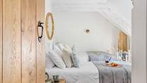 A twin that has views out to the front, please note the sloping ceiling which only adds to the character!