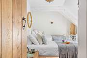 A twin that has views out to the front, please note the sloping ceiling which only adds to the character!