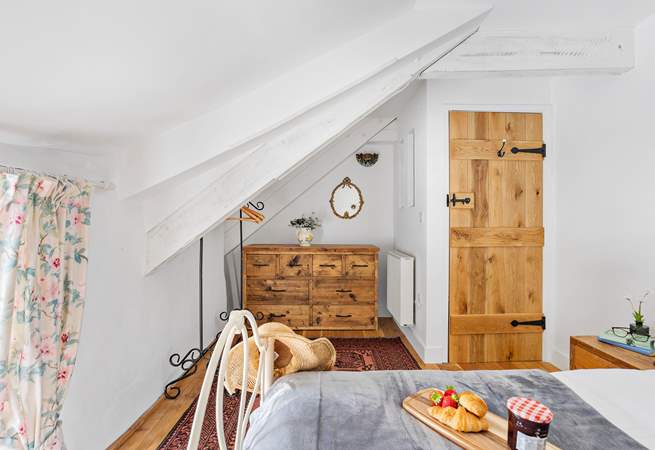 Head back out onto the landing through the bedroom door.