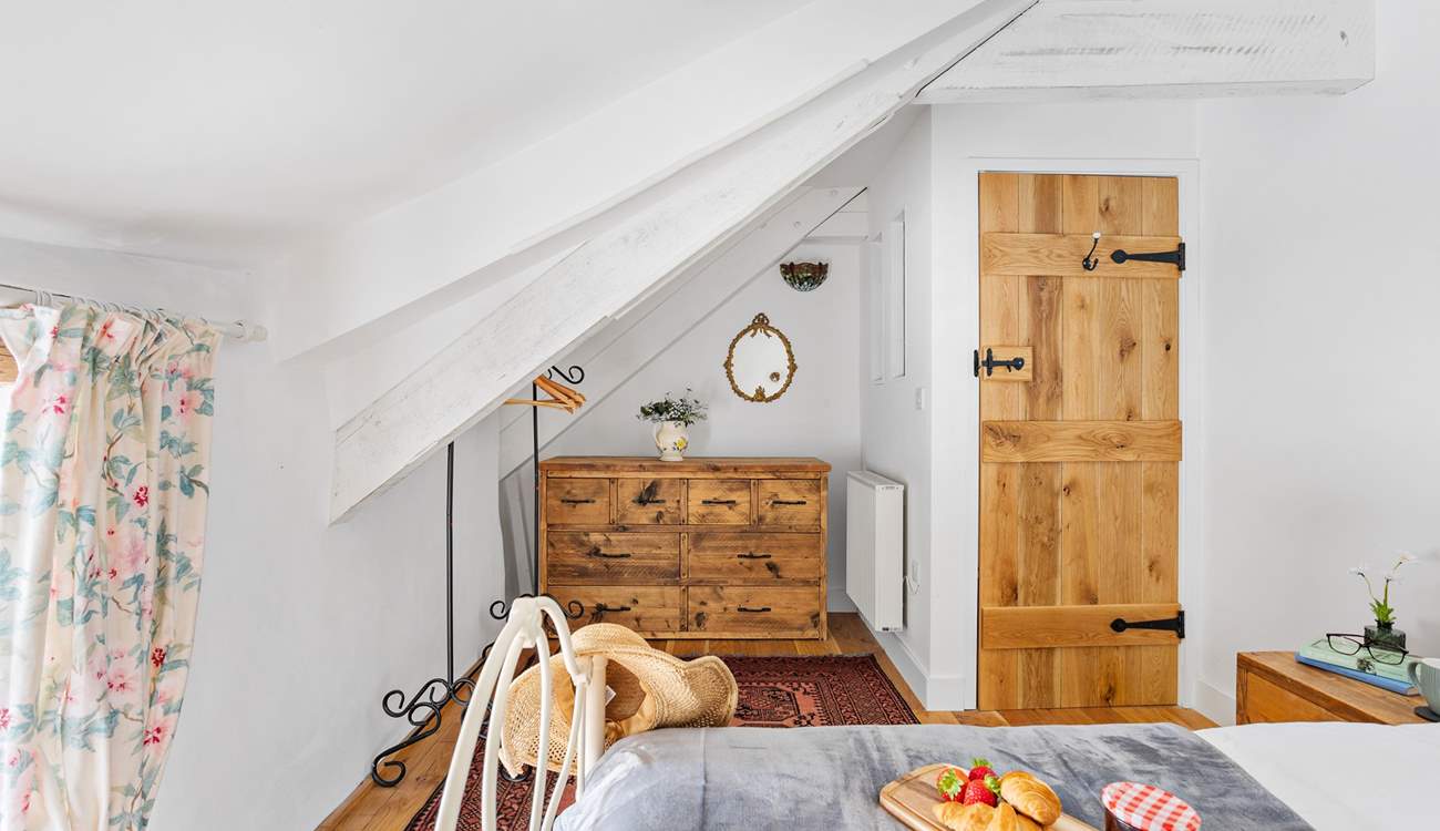 Head back out onto the landing through the bedroom door.