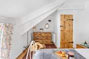Head back out onto the landing through the bedroom door.