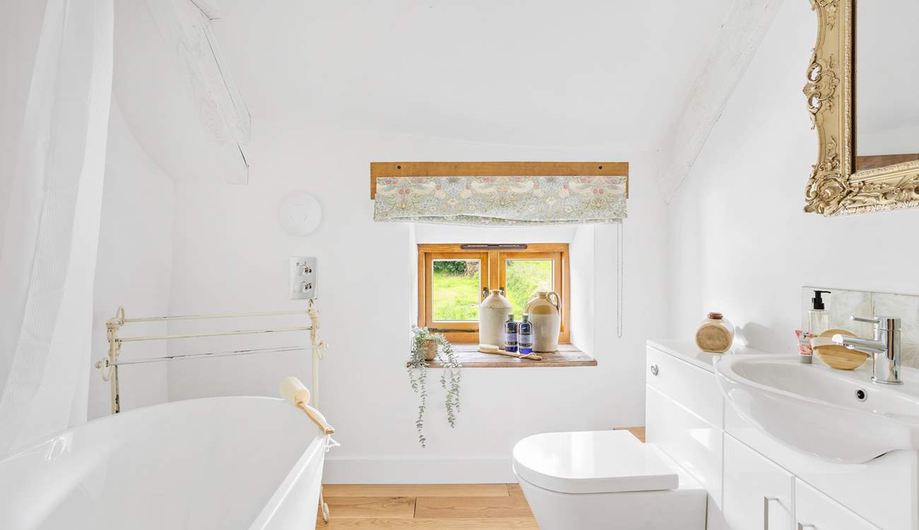 The bathroom has a rainfall shower.