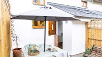 You have a small enclosed courtyard area however there's a further five acres of land to enjoy with your four-legged friends. 