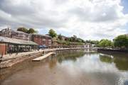 The quayside at Exeter has riverside restaurants and walks.