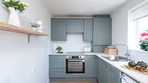 The kitchen is light and airy.