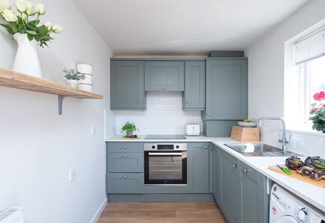 The kitchen is light and airy.