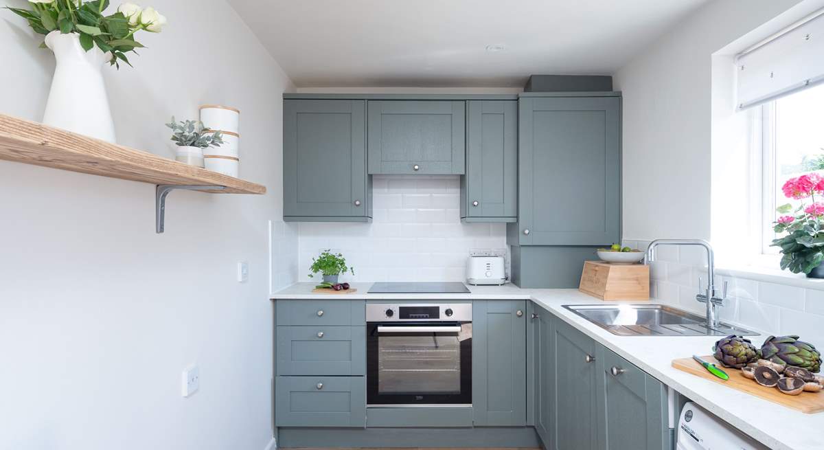 The kitchen is light and airy.