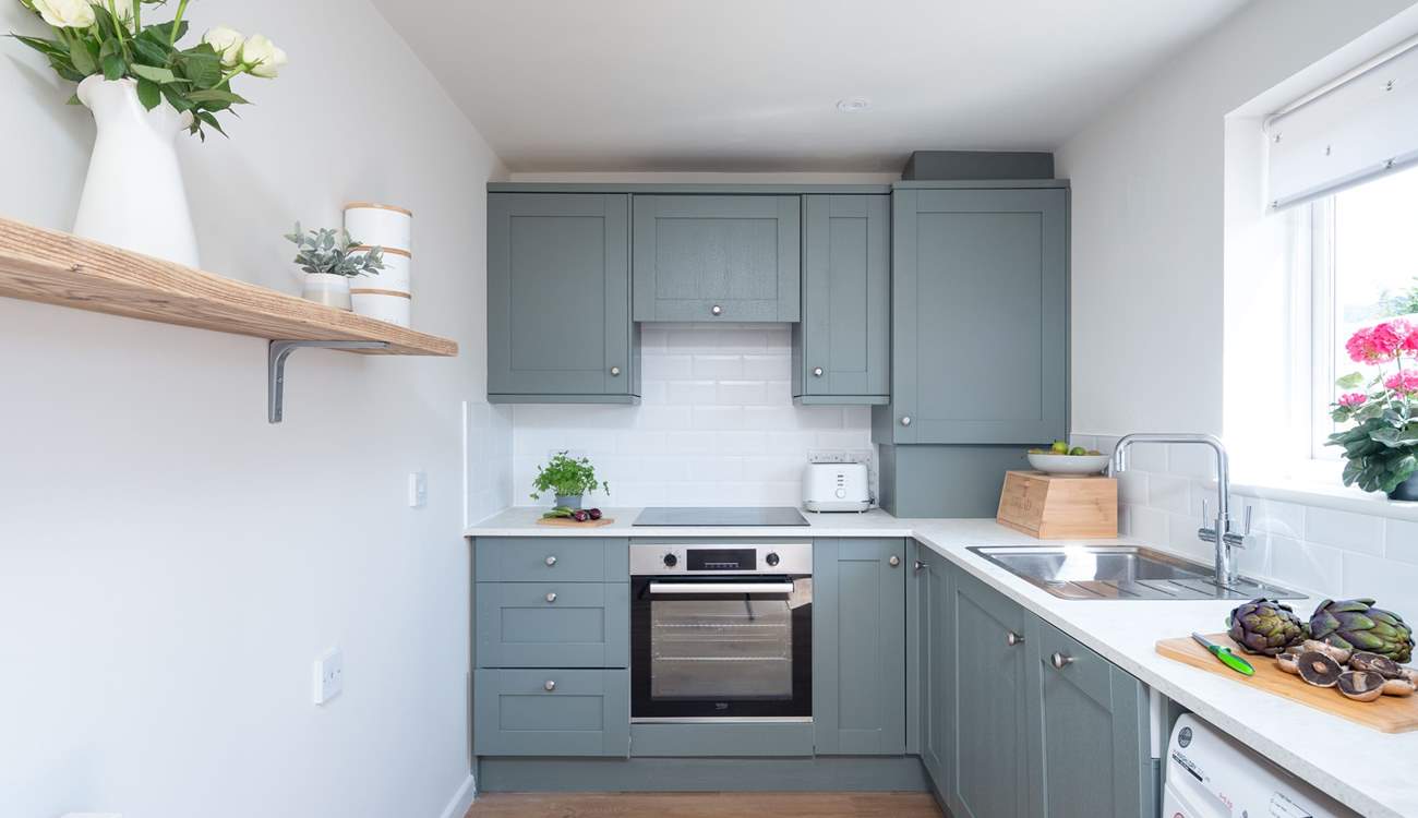 The kitchen is light and airy.