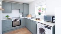 The modernised kitchen is fully equipped.