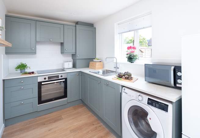 The modernised kitchen is fully equipped.