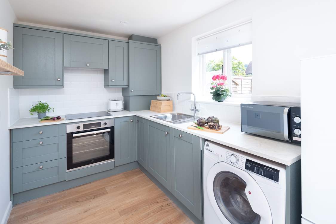 The modernised kitchen is fully equipped.