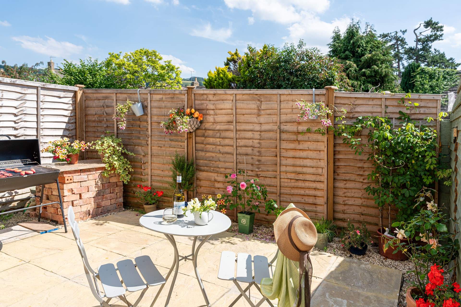 The pretty courtyard garden is a sun-trap.