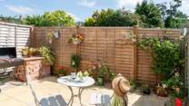 The pretty courtyard garden is a sun-trap.
