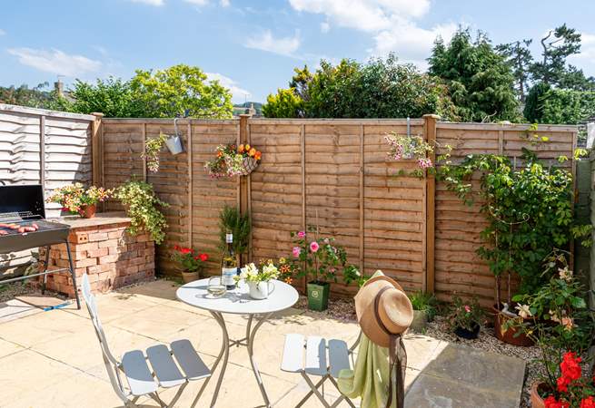 The pretty courtyard garden is a sun-trap.