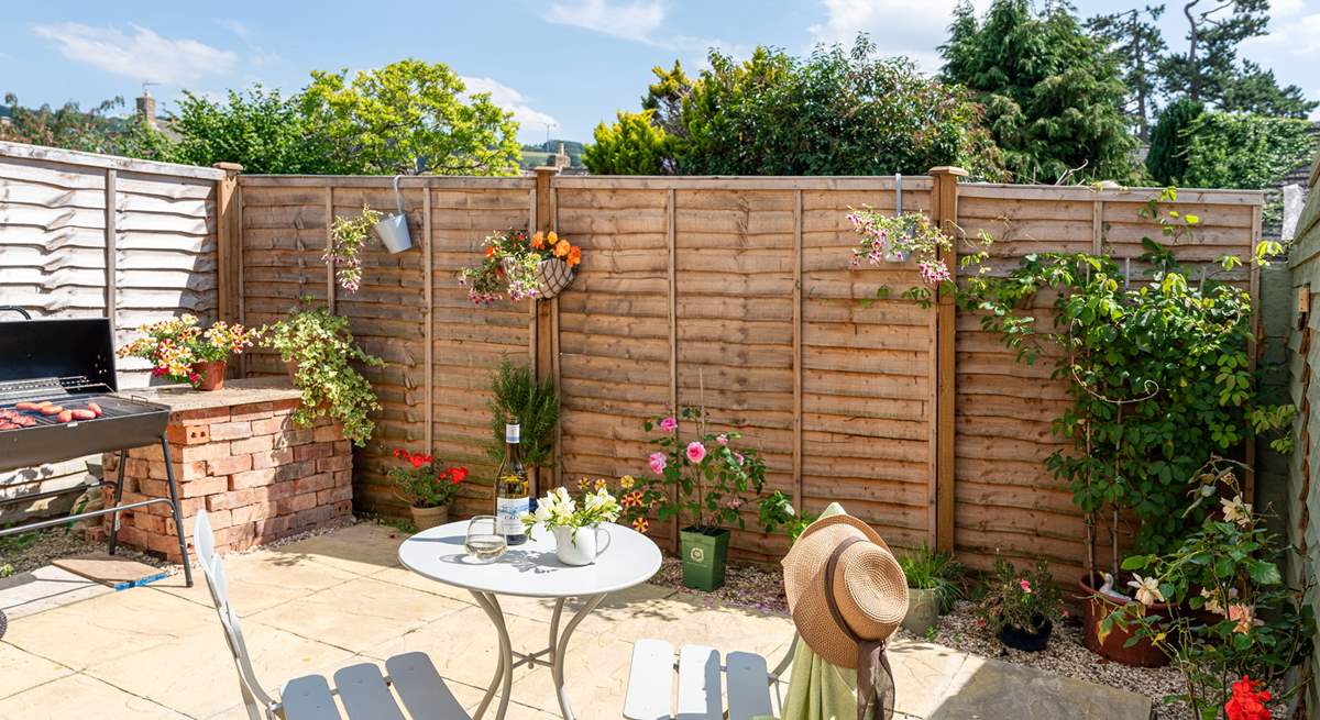 The pretty courtyard garden is a sun-trap.