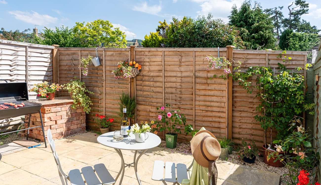 The pretty courtyard garden is a sun-trap.