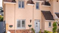 The cottage has private parking, a rare luxury in this sought-after Cotswold village.