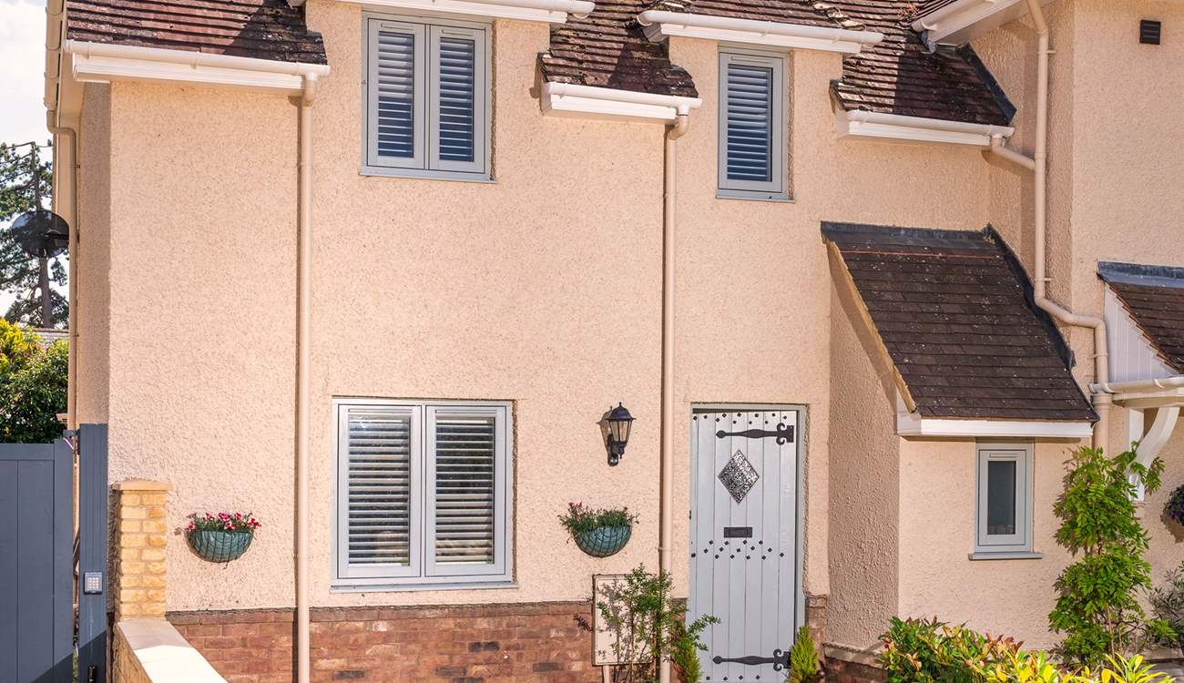 The cottage has private parking, a rare luxury in this sought-after Cotswold village.